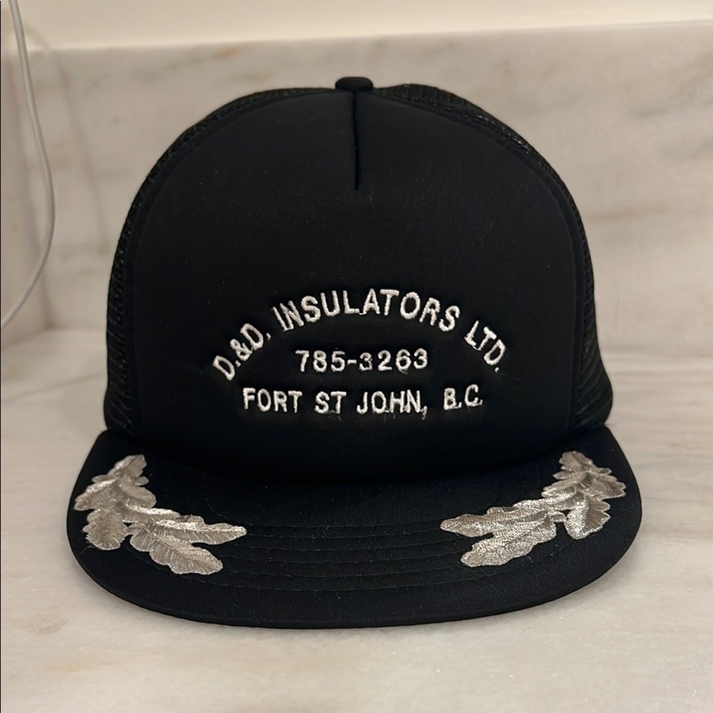 Black vintage trucker hat - silver oak leaf design